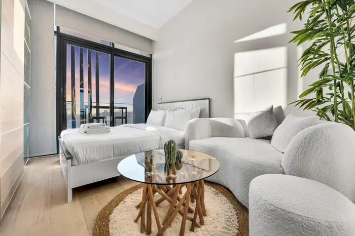 Studio with sunset balcony view